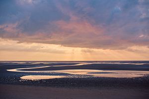 Zonsondergang over de Waddenzee van Florian Kunde