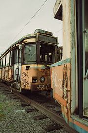 Connected in Oblivion: Abandoned Trams Connected Together on Railway Line by Melvin Meijer