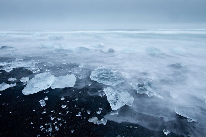 Ice on lava beach by Sam Mannaerts