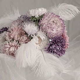 bouquet of pastel coloured asters with feathers by arjan doornbos