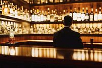 View of bartender with spirits