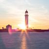 Zonsopkomst bij de vuurtoren van Louise Poortvliet