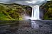 De waterval Skógafoss in IJsland van Yvette Baur