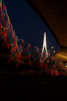 Falling light on the stairs of the Erasmus Bridge.
