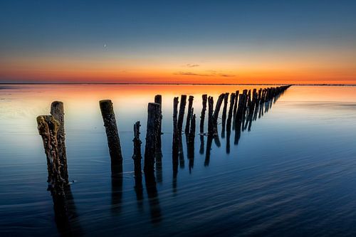 Zonsondergang Waddenzee vloed