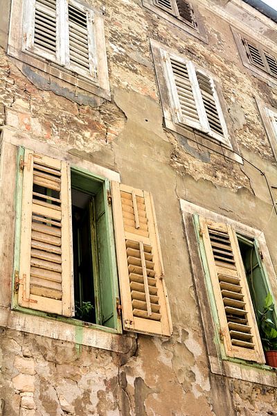 Facade of an old house in the historical idyllic old town of Pula by Heiko Kueverling