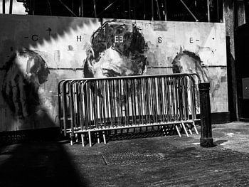Graffiti drawing of a man in a scaffold in London