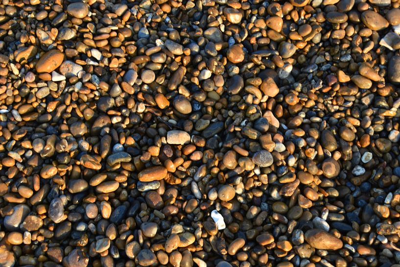 Pebbles on the beach by Hans Lok