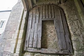 Old wooden door entrance gate of Bricquebec, Normandy by Peter Bartelings