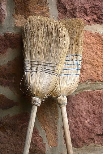 Straw brooms in love