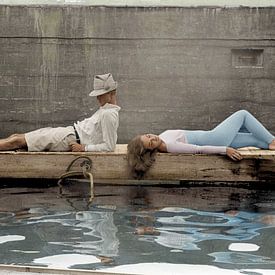 Woman and man lying on a dock, 1940