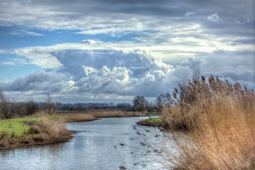 Beautiful cloudy skies above the Valleikanaal in February by Eric Wander