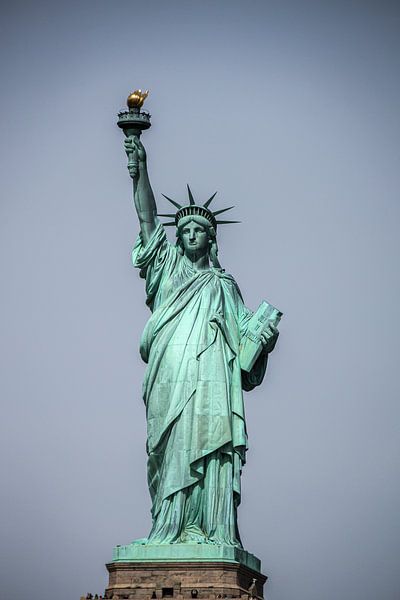 The Statue of Liberty, located on Liberty Island in New York, USA by Travel Tips and Stories
