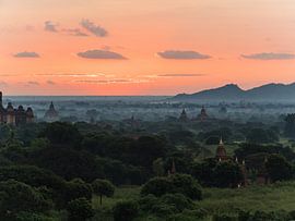 Sunset at temple field in Bagan, Myanmar by Shanti Hesse