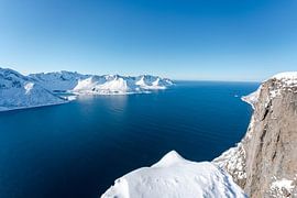 Ski touring in winter on Senja near Hester with a view of the fjords by Leo Schindzielorz