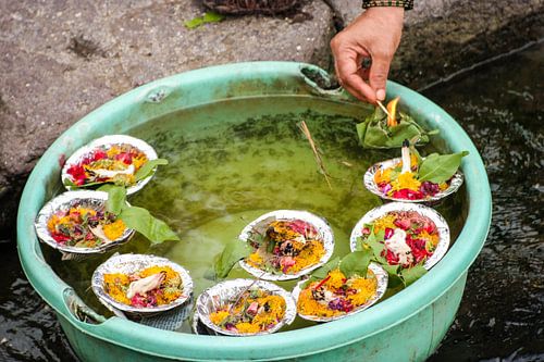 Blessed water India with colourful flowers