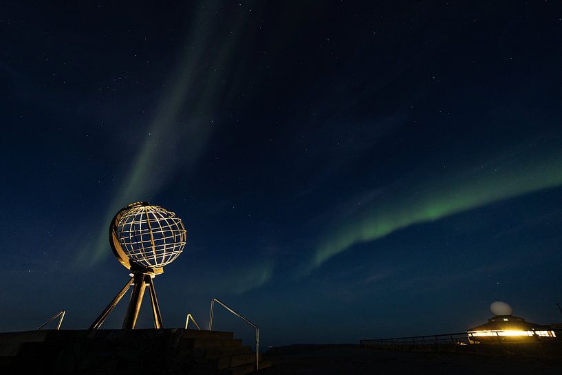 The Northern Lights over the North Cape. by Menno Schaefer