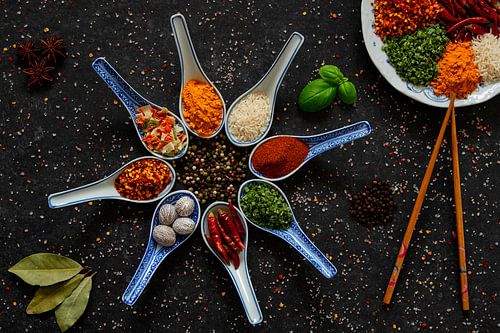 Spices and herbs in a colourful palette.