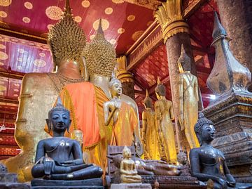 Buddha statues in the temple in Luang Prabang, Laos by Rietje Bulthuis
