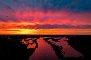 Colorful sunset over the river IJssel