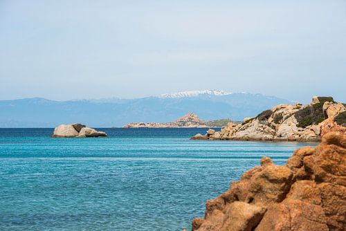 the beautiful island of maddalena , compared with the maledives, with blue sea and the mountains as 