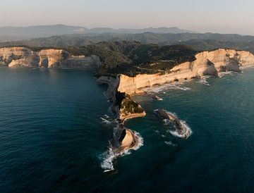 Cape Drastis in morning light - view of Corfu's limestone cliffs by Ashwien Jurawan