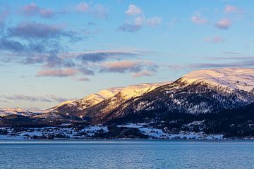Mountains and rocks in winter near Trondheim in Norway by Rico Ködder
