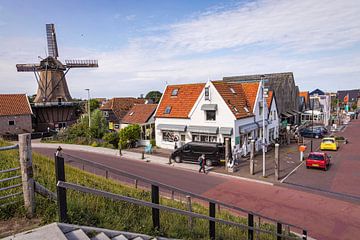 Windmill in the fishing village Oudeschild on Texel by Rob Boon