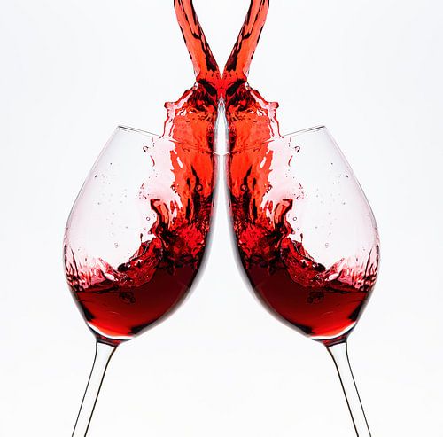 Red wine flows into the wine glass