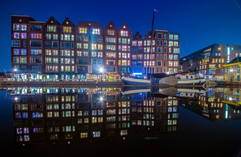 Turfmarkt with boat in Alkmaar by peterheinspictures