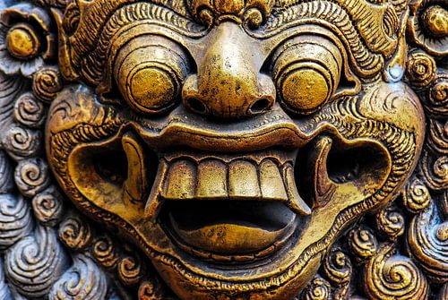 Statue Gods Face Hindu Golden on Bali Indonesia