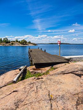 Baltic coast with rocks and jetty on Sladö island by Rico Ködder