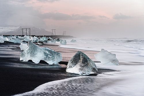 Morning light on the black ice beach in Iceland
