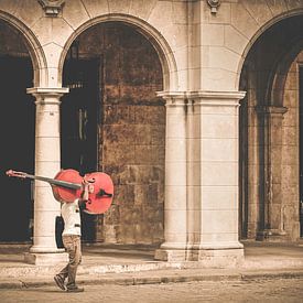 man with cello Havana Cuba by Emily Van Den Broucke