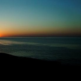Sonnenuntergang an der Küste von Guido Coppis