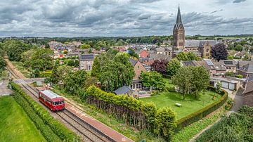 Dronefoto van de Railbus bij Station Bocholtz in Zuid-Limburg van John Kreukniet