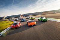 Colourful supercars at sunrise