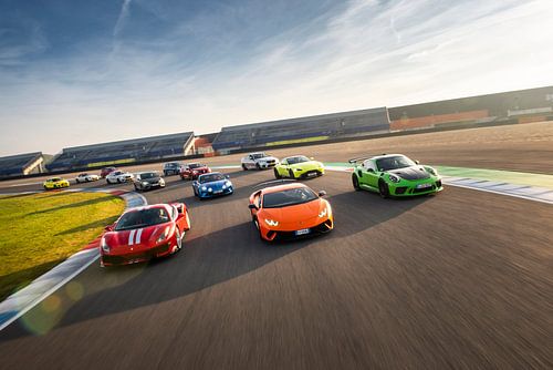 Colourful supercars at sunrise