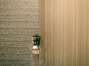 Tractor preparing the soil for planting crops