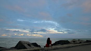 Meerjungfrau in Scheveningen bei Sonnenaufgang.