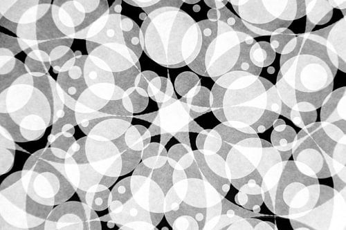 Abstract pattern of round shapes in black and white
