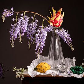 Still life of dragon fruit with wisteria and malachite by Willy Sengers