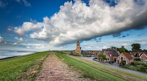 Dark cloud over the church tower of Wierum (Friesland)