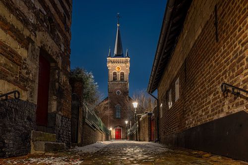 Elsloo in de avond in de winter met sneeuw
