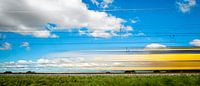 train and dutch skies