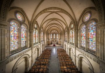 Church with stained glass windows by Inge van den Brande