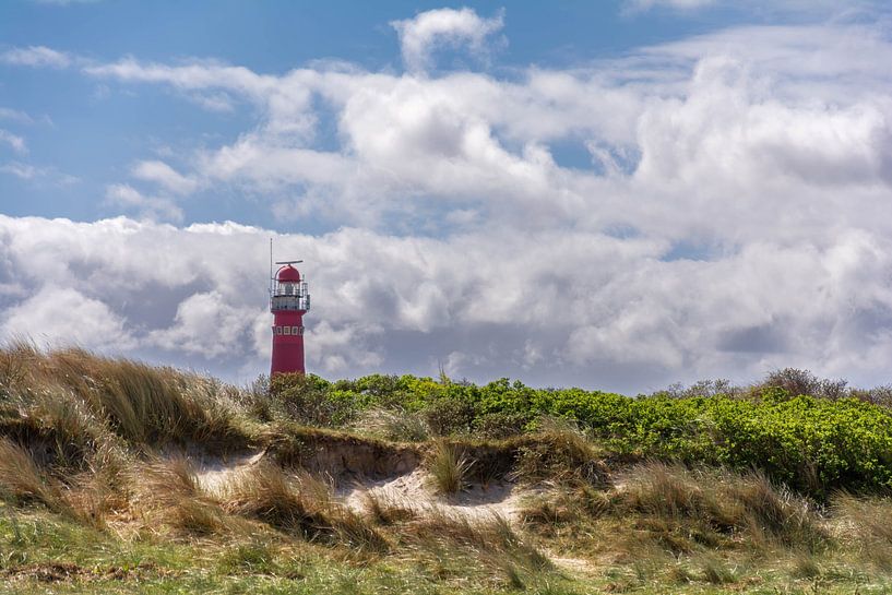 Landscape with lighthouse, dunes and cloudy sky by Lisette Rijkers
