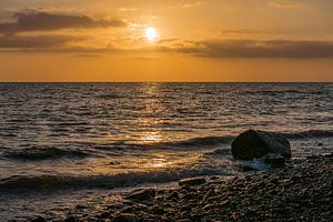 Sunset on shore of the Baltic Sea van Rico Ködder