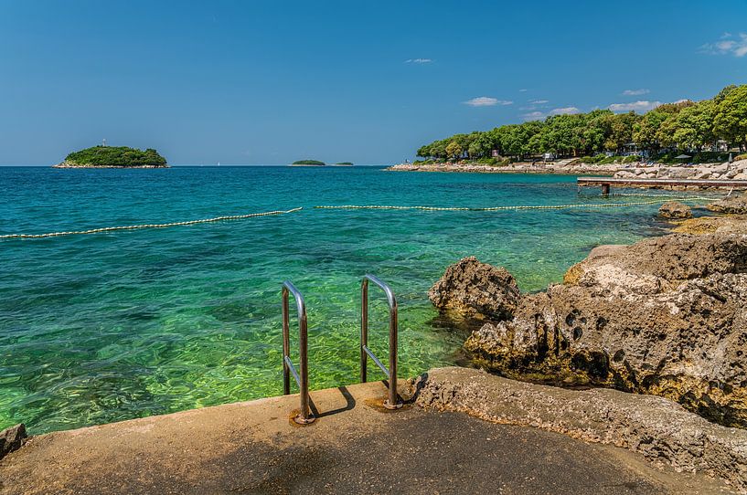 Swimming in the turquoise blue waters of Vrsar by Jeroen de Jongh Photography