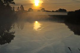 Sunrise over Weel in Zeeland by Robbin van der Ent
